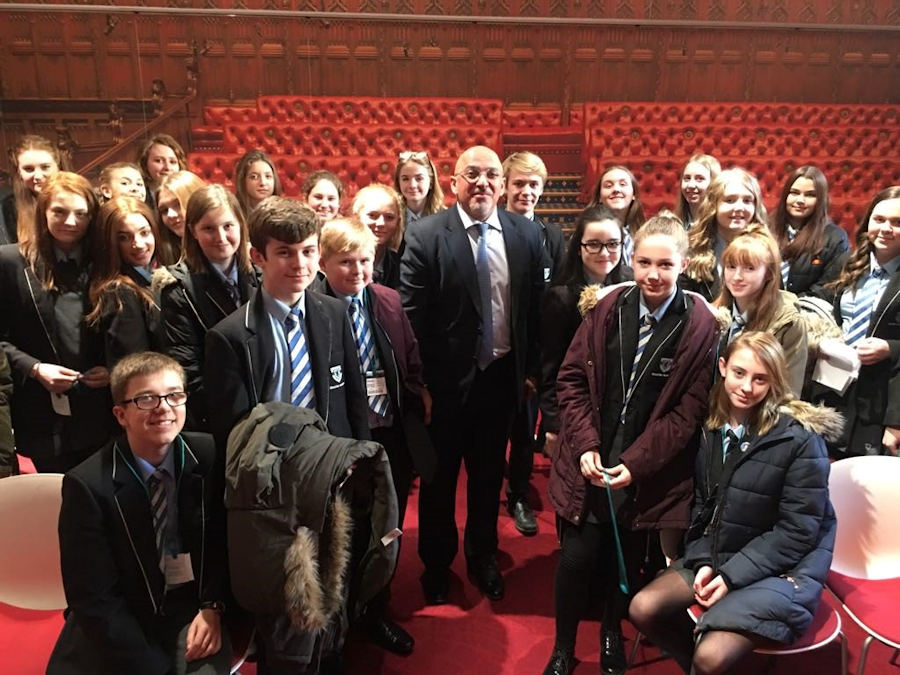 Nadhim Zahawi welcomes students from Alcester Academy to Parliament.