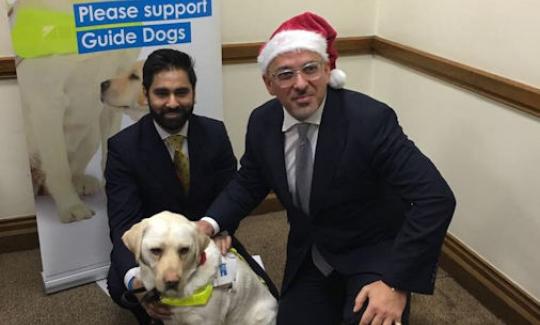 Nadhim Zahawi attends Guide Dogs event in Parliament.